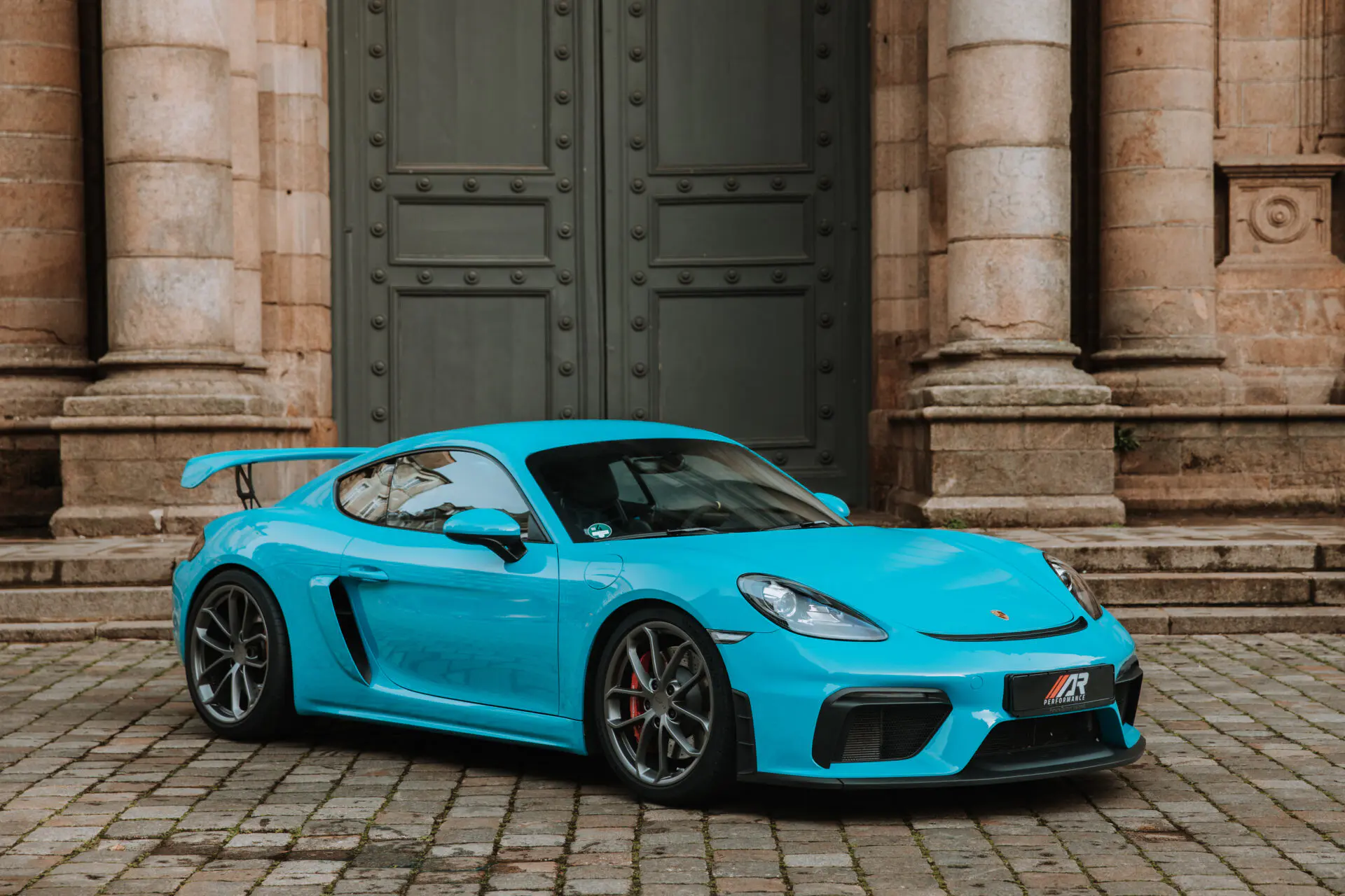 Porsche 718 Cayman bleu Miami