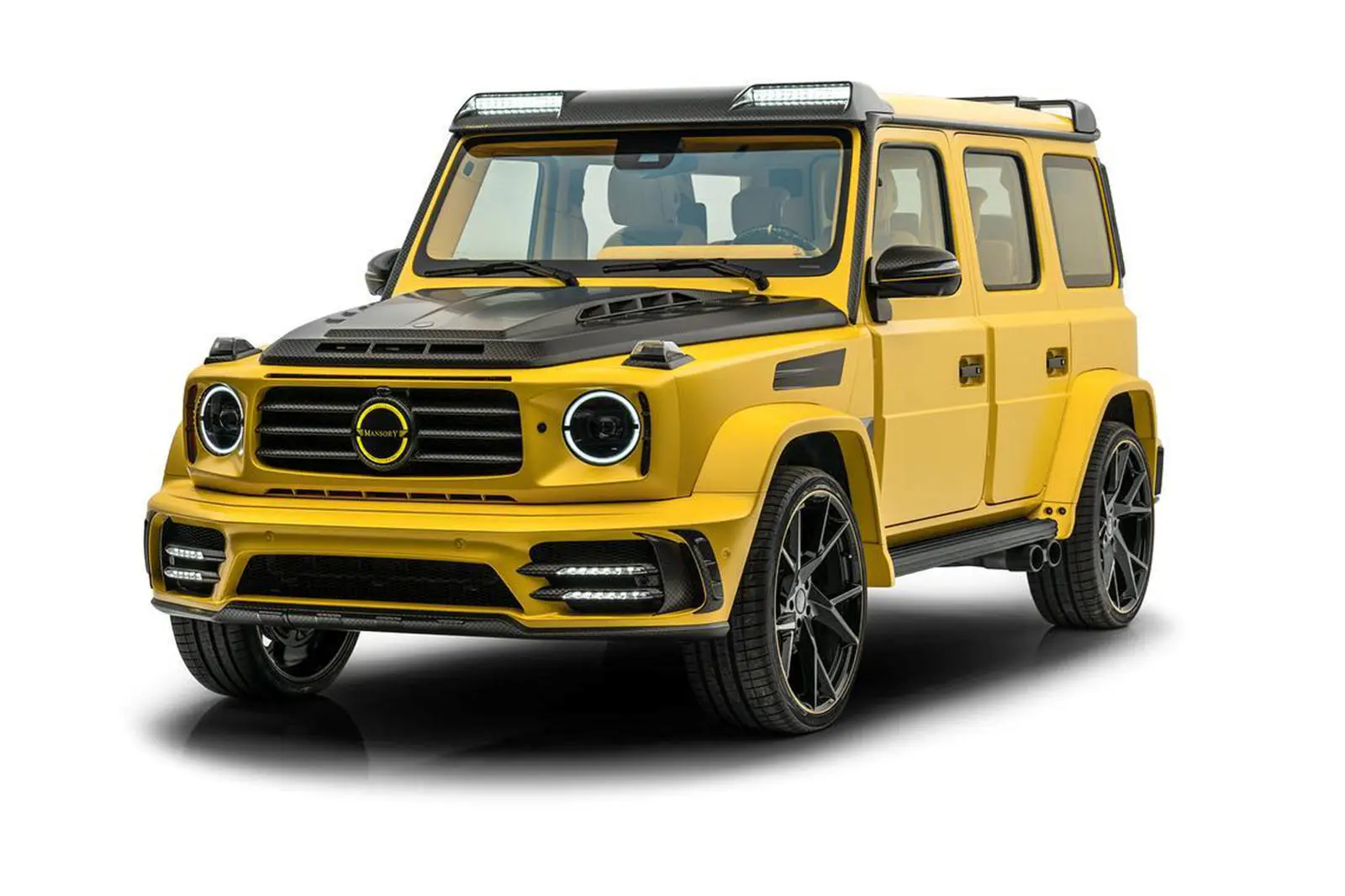 découvrez la mansory g jaune, une voiture de luxe qui allie performance exceptionnelle et design audacieux. avec son allure distinctive et ses finitions de haute qualité, cette version modifiée du célèbre suv offre une expérience de conduite inégalée. plongez dans l'univers du tuning haut de gamme avec la mansory g jaune.